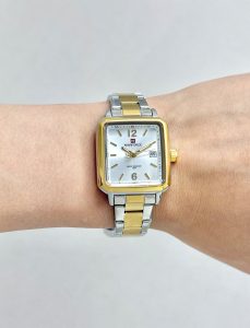 ساعت مچی زنانه ناویفورس مدل nf9252L سیلور و طلایی روی مچ